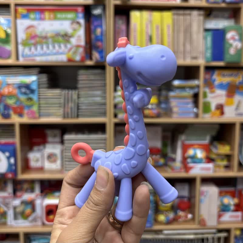 7928ad0f-01fc-47d7-9563-e15c155ed9b1 دندانی زرافه سیلیکونی صورتی