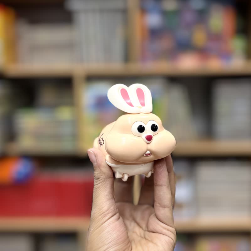 09d7fce4-19bd-4303-b29e-7d2d758ecacb کوکی خرگوش فشاری کرم تیره