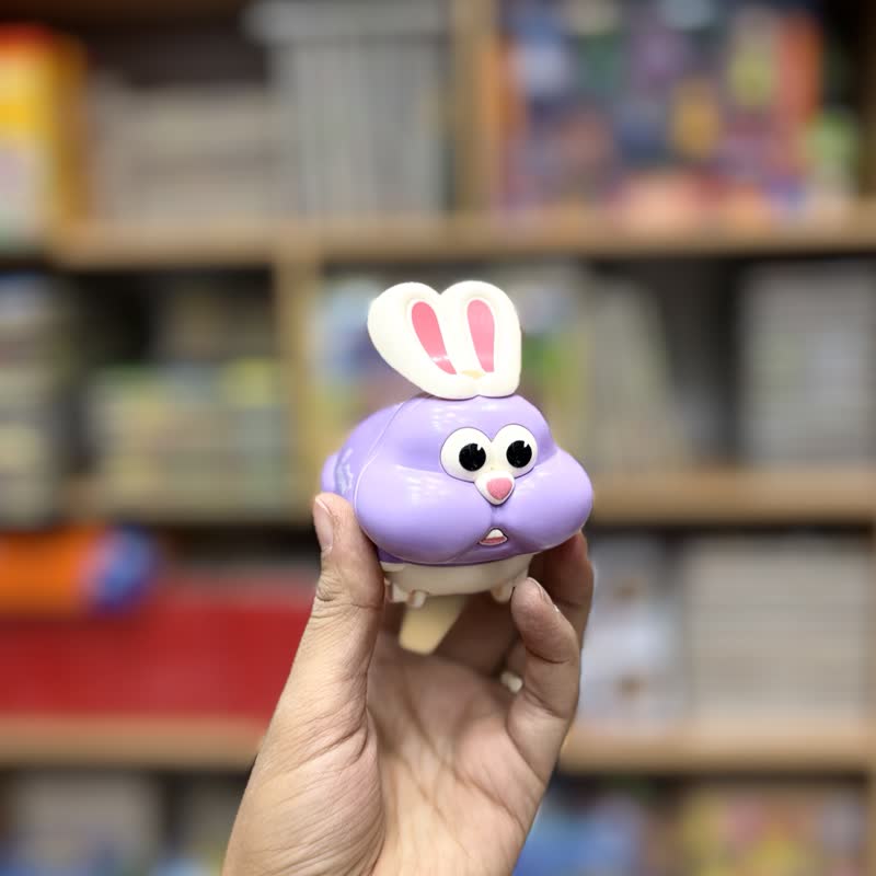 4f993283-e673-46e4-9490-bf453b053d7b کوکی خرگوش فشاری بنفش