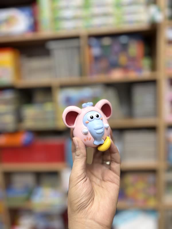 ab29bc03-87ef-4e45-9e24-6588b1c60d20 کوکی فیل و موز نخکشی صورتی